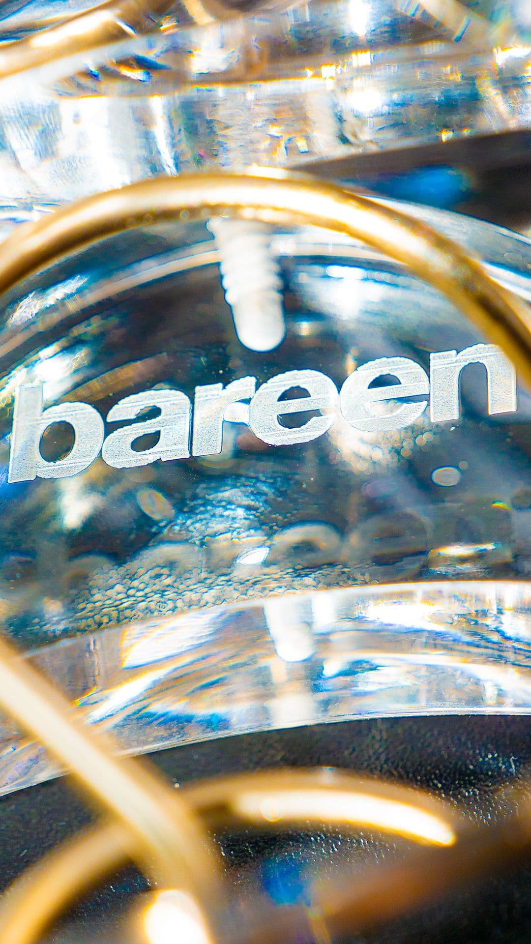 the word bareen that is on a glass